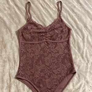 Purple lace body suit